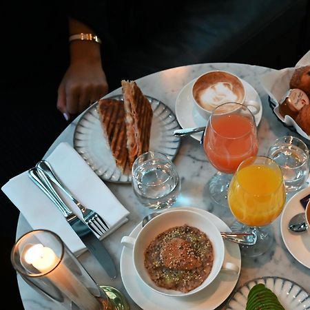 Villa Dagmar Stockholm Exterior photo A typical breakfast at the restaurant